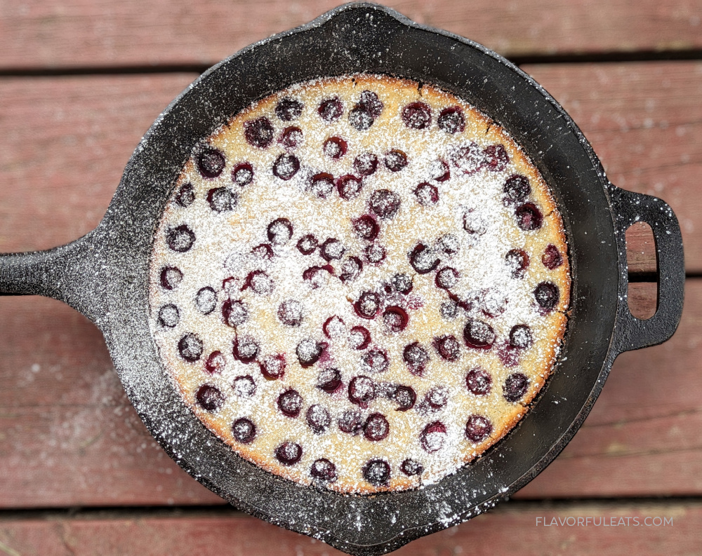 Blueberry Skillet Cake with powdered sugar sprinkled over top.
