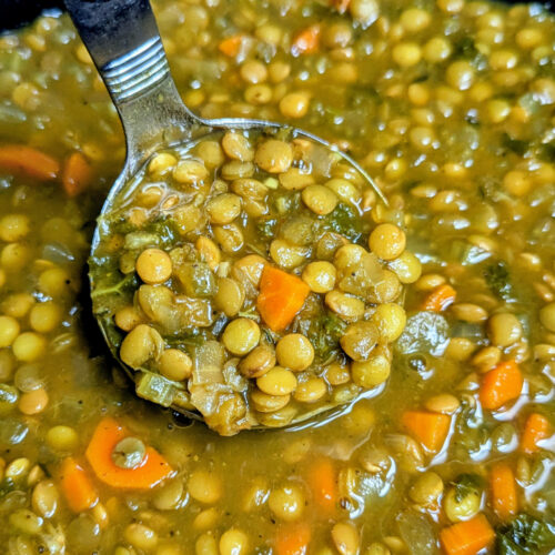 A ladle full of Slow Cooker Curried Lentil Soup